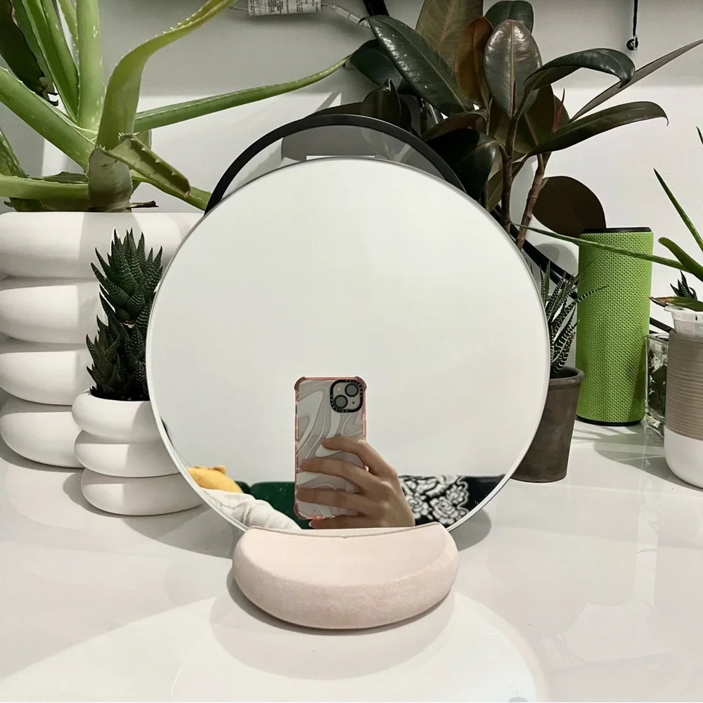 Elegant Round Mirror with Ceramic Base